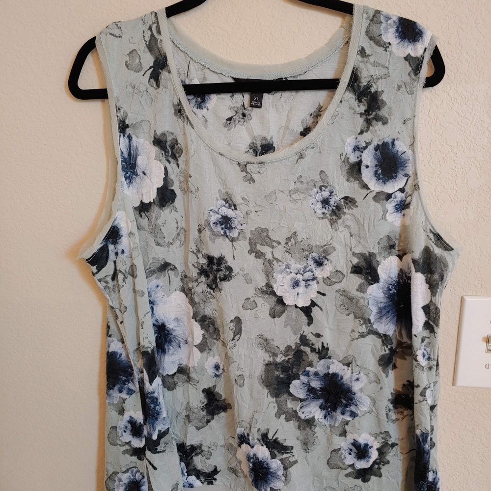 Green floral sleeveless blouse